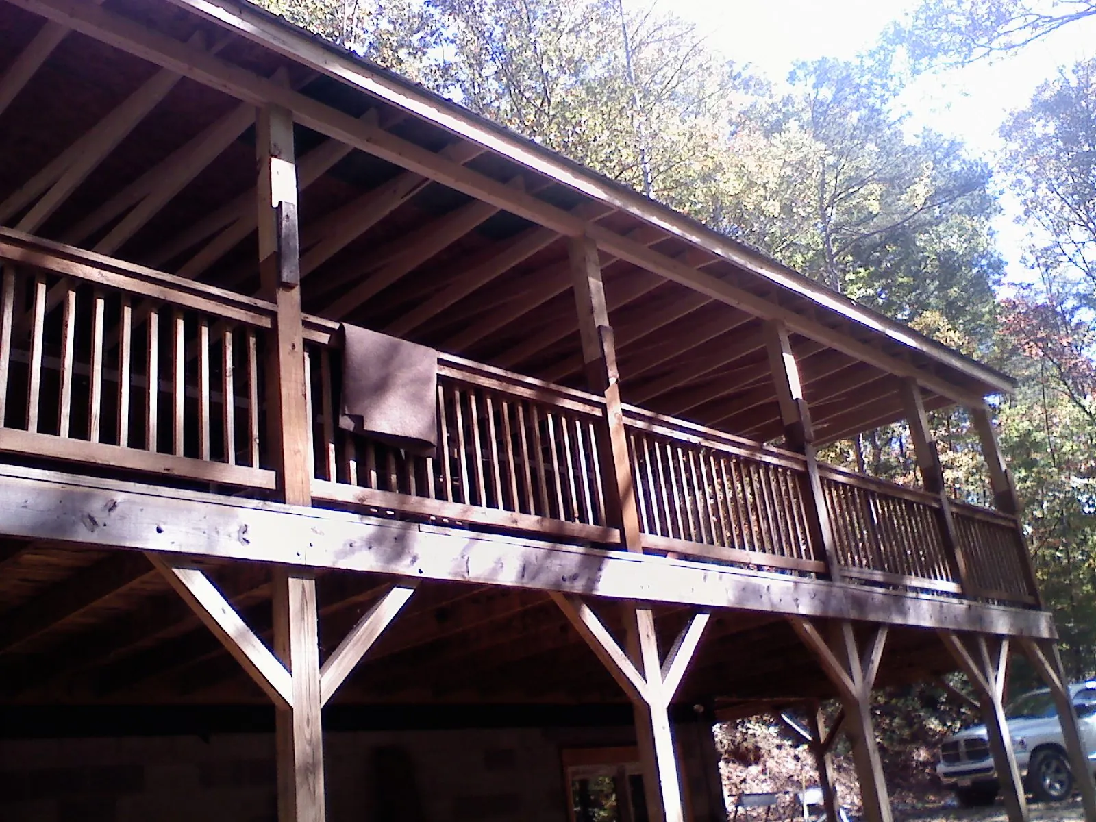 Timber framing under a new elevated porch and deck — Roof Leak Repair in Fort Deposit by Roofing Brothers